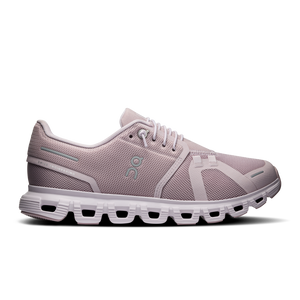 A pair of women's athletic shoes in gray color with a mesh upper and a white sole.
