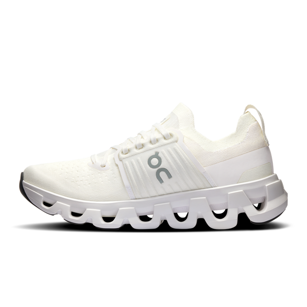 The medial side of this women's shoe has a saddle through the midsole.