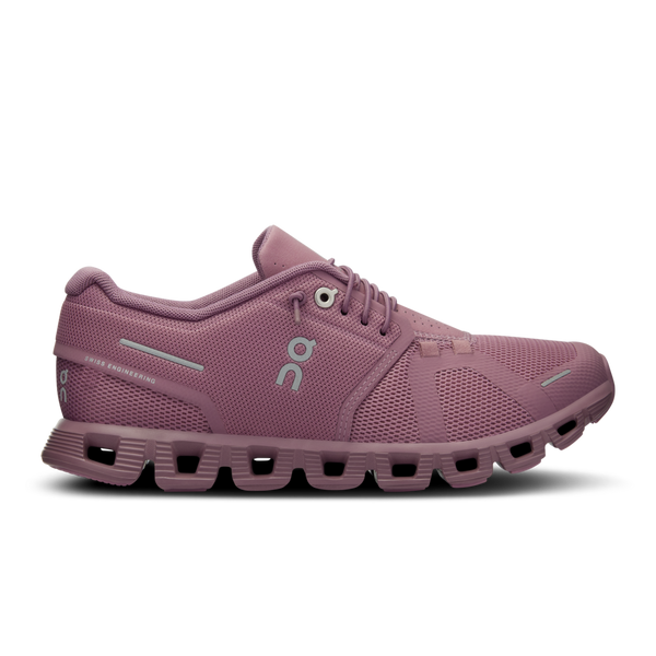 Pink running shoe with a white background.