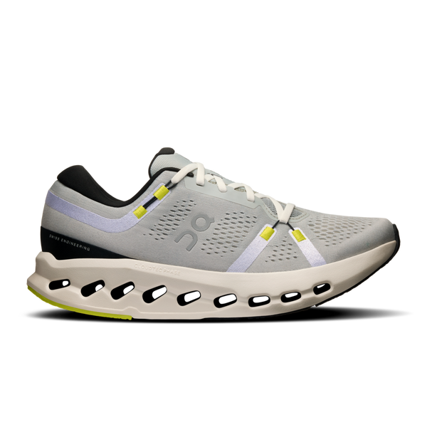 A pair of On running shoes with a gray upper and yellow accents, including the brand logo on the side.