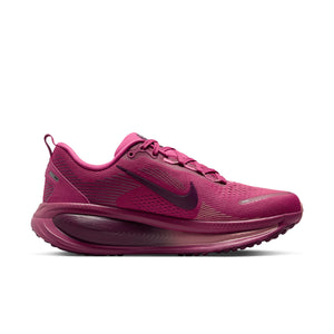 Very dark pink running shoe with Nike logo on a white background.