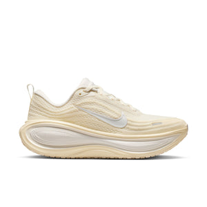 Nike women's running shoe in a tonal look with white sole on a white background.
