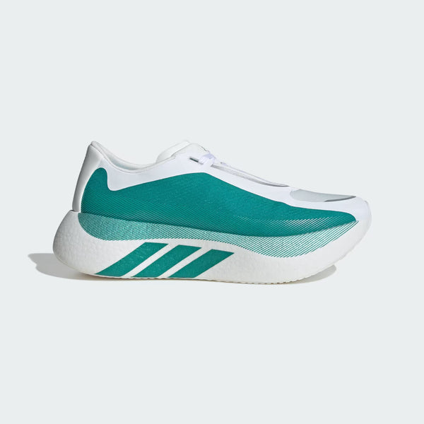 White and green sneaker with Adidas logo on a light gray background