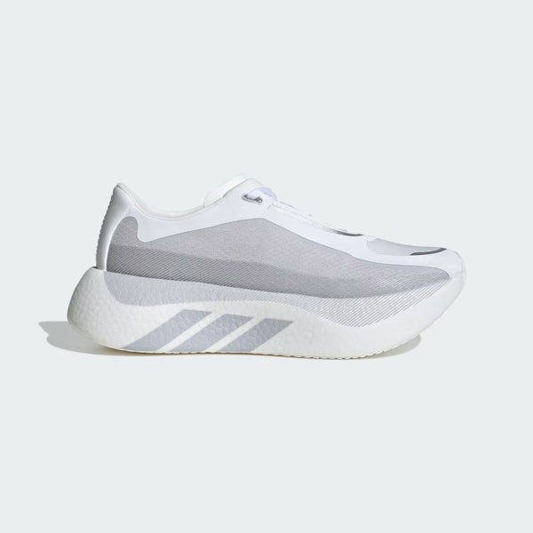 White and gray sneaker with Adidas logo on a light gray background
