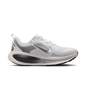 White running shoe with Nike logo on a white background