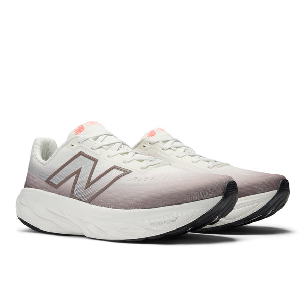 Pair of New Balance running shoes on a white background.