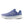 The medial side of a blue running shoe with New Balance logo on a white background.