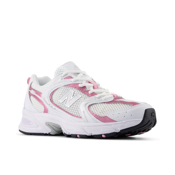 A mostly all white lifestlye shoe with several overlays of upper material.
