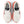 A pair of NB running shoes with a red midsoe and black tongue.