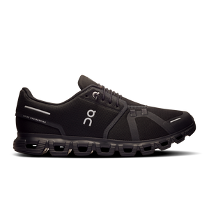 A pair of black men's athletic shoes with a distinctive brand logo on the side.