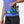 Person wearing a running belt with GLUKOS energy gels and a water bottle on a plain background