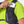 Person wearing a Nathan running vest with a phone case attached.