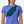 Person wearing a green waist bag with 'Nathan' branding on a plain background