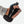 Hand wearing a black glove holding a blue and black device on a white background