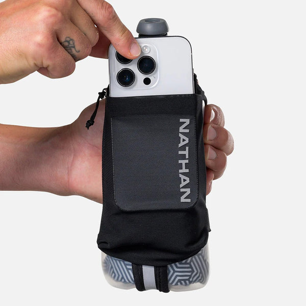 Hand holding a phone with a black pouch labeled 'Nathan' against a white background