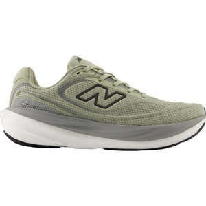 Green running shoe with white sole on a white background