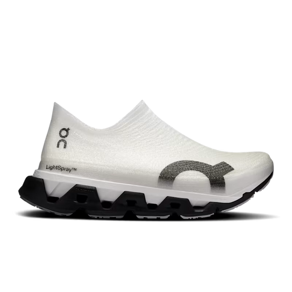 White athletic shoe with black sole on a white background