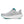 A light gray Saucony running shoe with a thick white midsole and teal accents on the logo, collar lining, and outsole, shown on a white background.