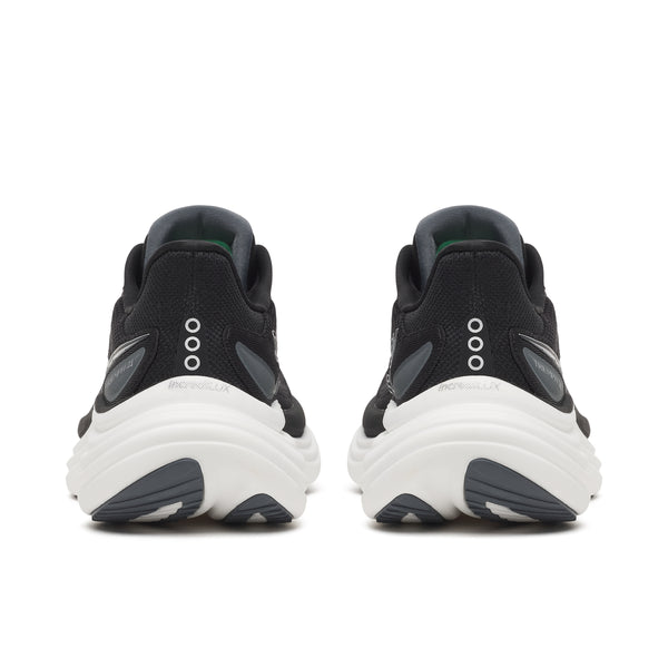 Black running shoes with white soles on a white background