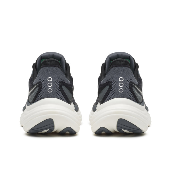 Black running shoes with white soles on a white background