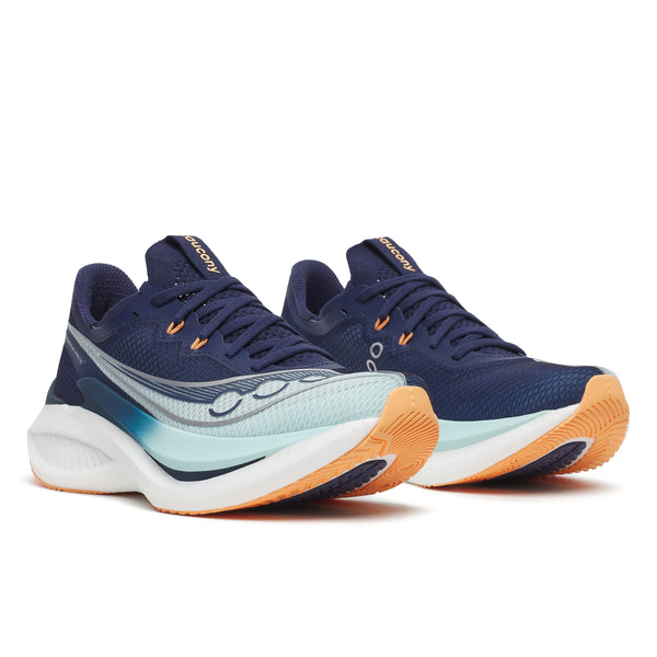 Pair of blue and orange running shoes on a white background