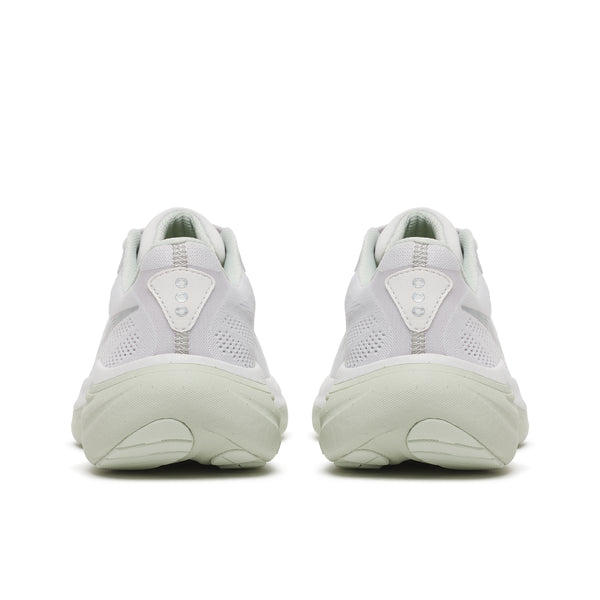 White athletic shoes with sole design on a white background