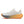 White running shoe with orange and gray sole on a white background
