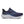 Navy running shoe with white sole on a white background