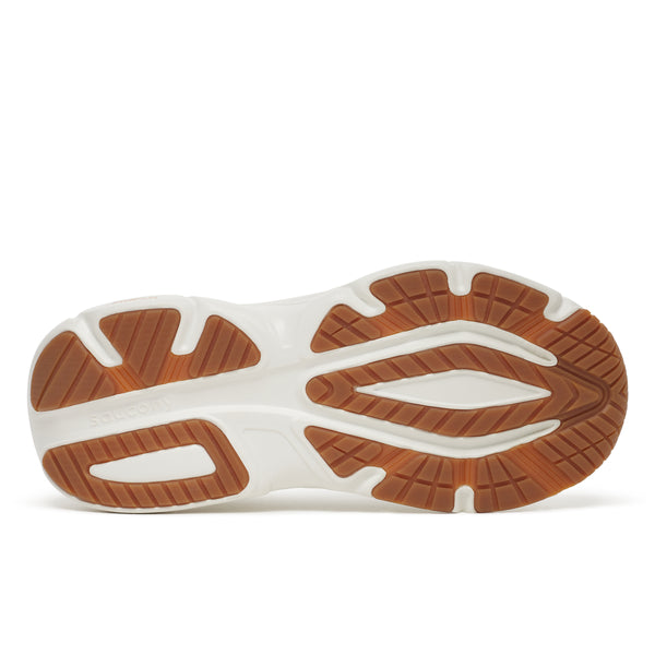 Close-up of a shoe sole with brown and white tread pattern on a white background