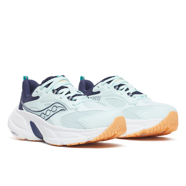 Pair of light blue running shoes with orange soles on a white background