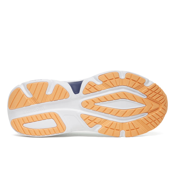 Close-up of a shoe sole with orange and white design on a white background