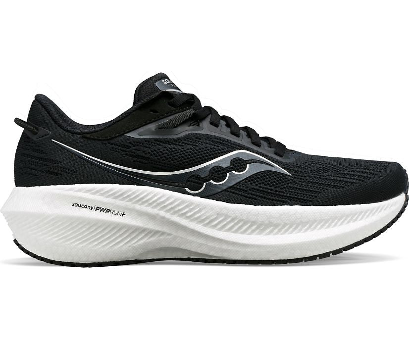 Lateral view of the Women's Saucony Triumph 21 in the wide D width, color Black/White
