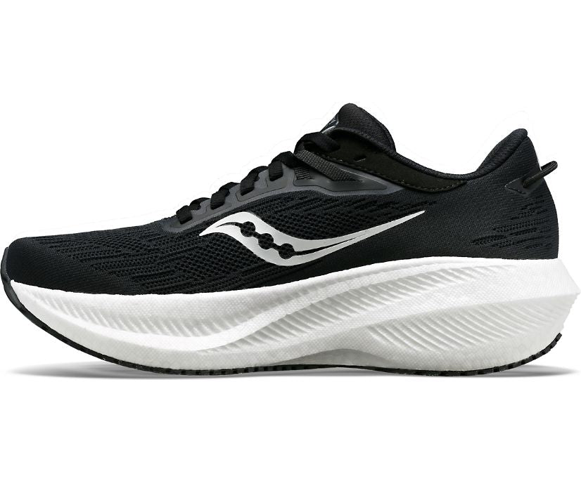 Medial view of the Women's Saucony Triumph 21 in the wide D width, color Black/White