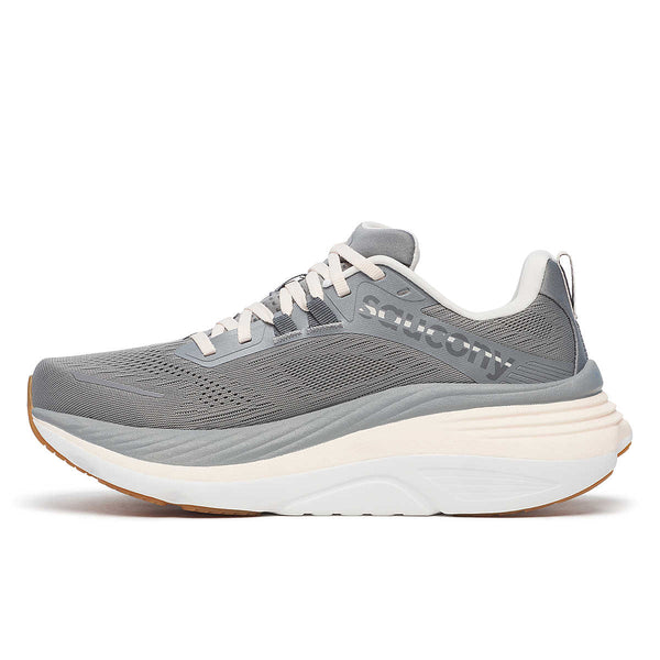 The medial side of this women's shoe has the brand name Saucony, written in tonal lettering.