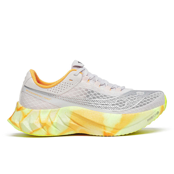 A pair of women's running shoes with white uppers and orange, yellow, and gray accents on a transparent sole.