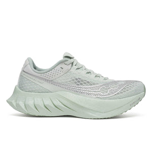 Light green Saucony running shoe on a white background.