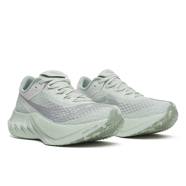 A Pair of Endorphin Pro light gray running shoes on a white background.