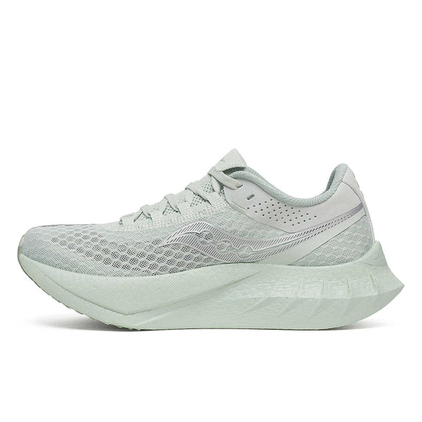 The medial side of a light gray running shoe on a white background.
