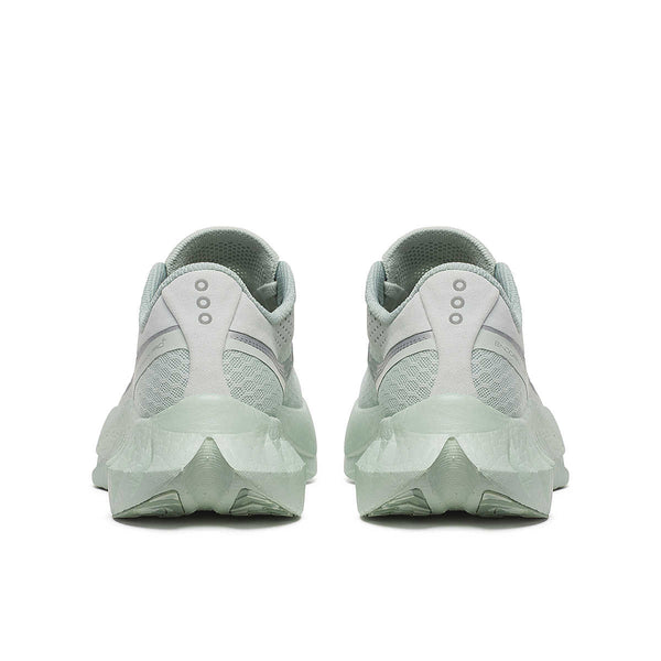 The heel area of a light gray carbon plated running shoes shown from the back on a white background.
