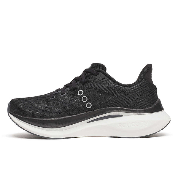 The medial side of a black Saucony running shoe with white sole on a white background.