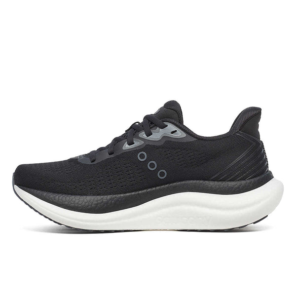Black running shoe with white sole on a white background with three dots near the midfoot.