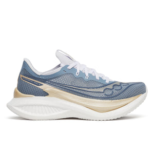 Blue and beige running shoe on a white background