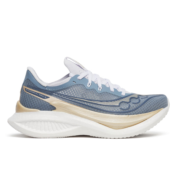 Blue and beige running shoe on a white background