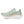 Light green running shoe on a white background