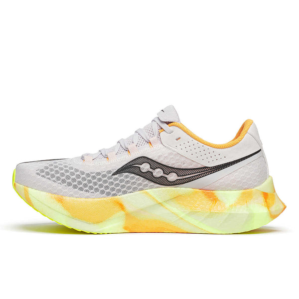 The medial side of these running shoes has a large Saucony logo in the middle.