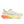 White Saucony running shoe with orange sole on a white background