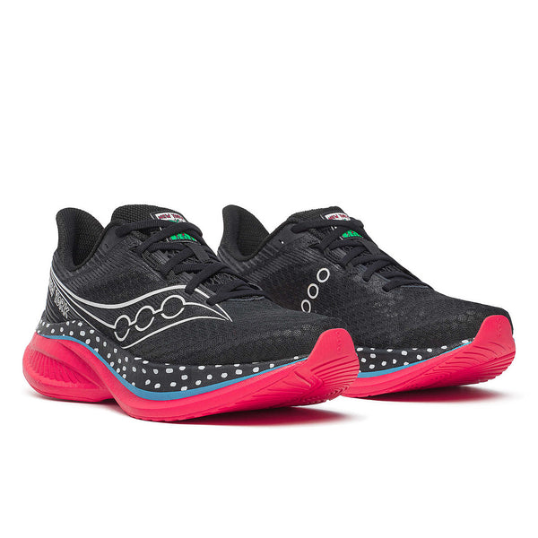 Black men's Saucony running shoes with pink soles on a white background.