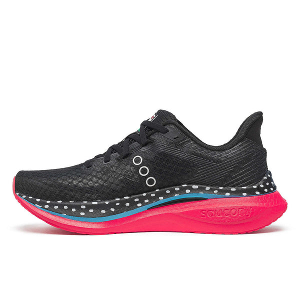 Black running shoe with pink sole and poka dots on the midsole.
