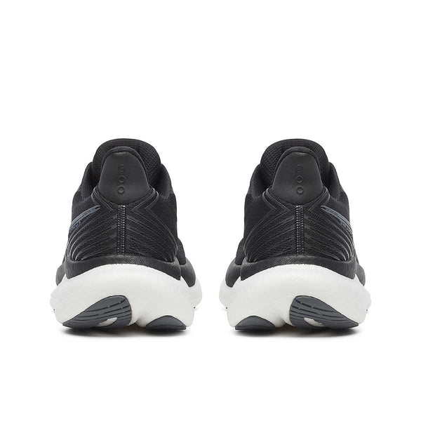 Black running shoes with white soles on a white background.