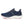 The medial side of a blue running shoe with white sole on a white background.